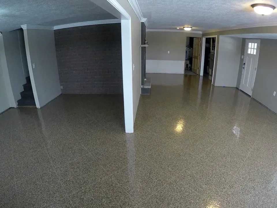 Basement rooms with a glossy flake floor.